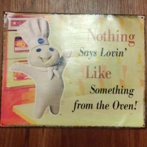 Large metal Pillsbury boy sign